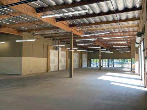 Vacant warehouse interior looking toward the rear wall