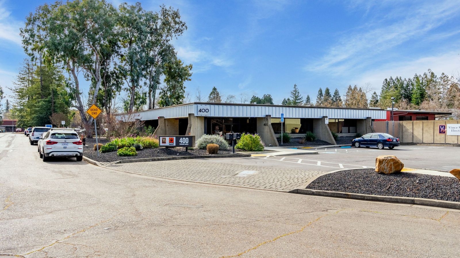 Front elevation and parking at 400 Tesconi Circle, Santa Rosa